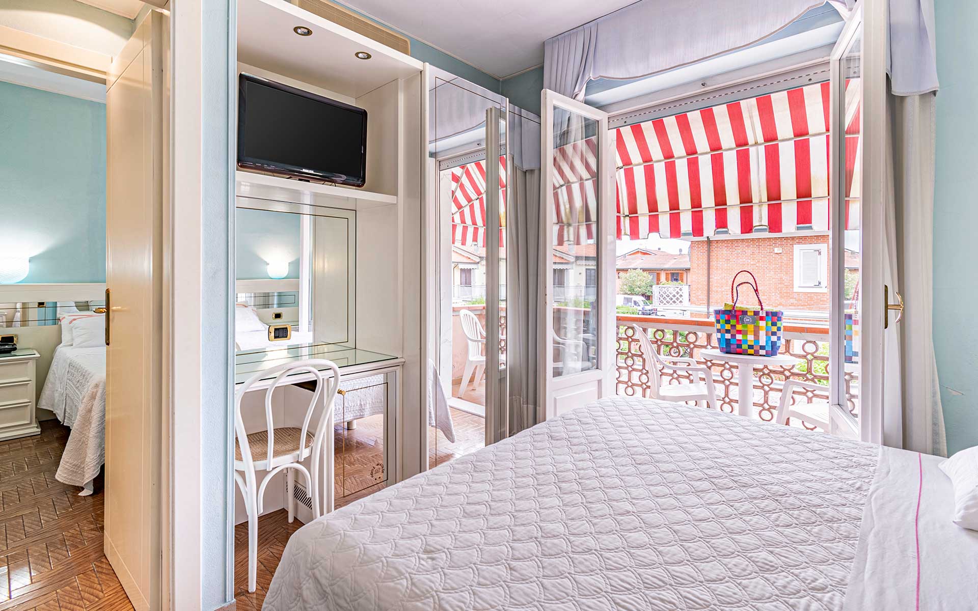 Camere comunicanti con balcone